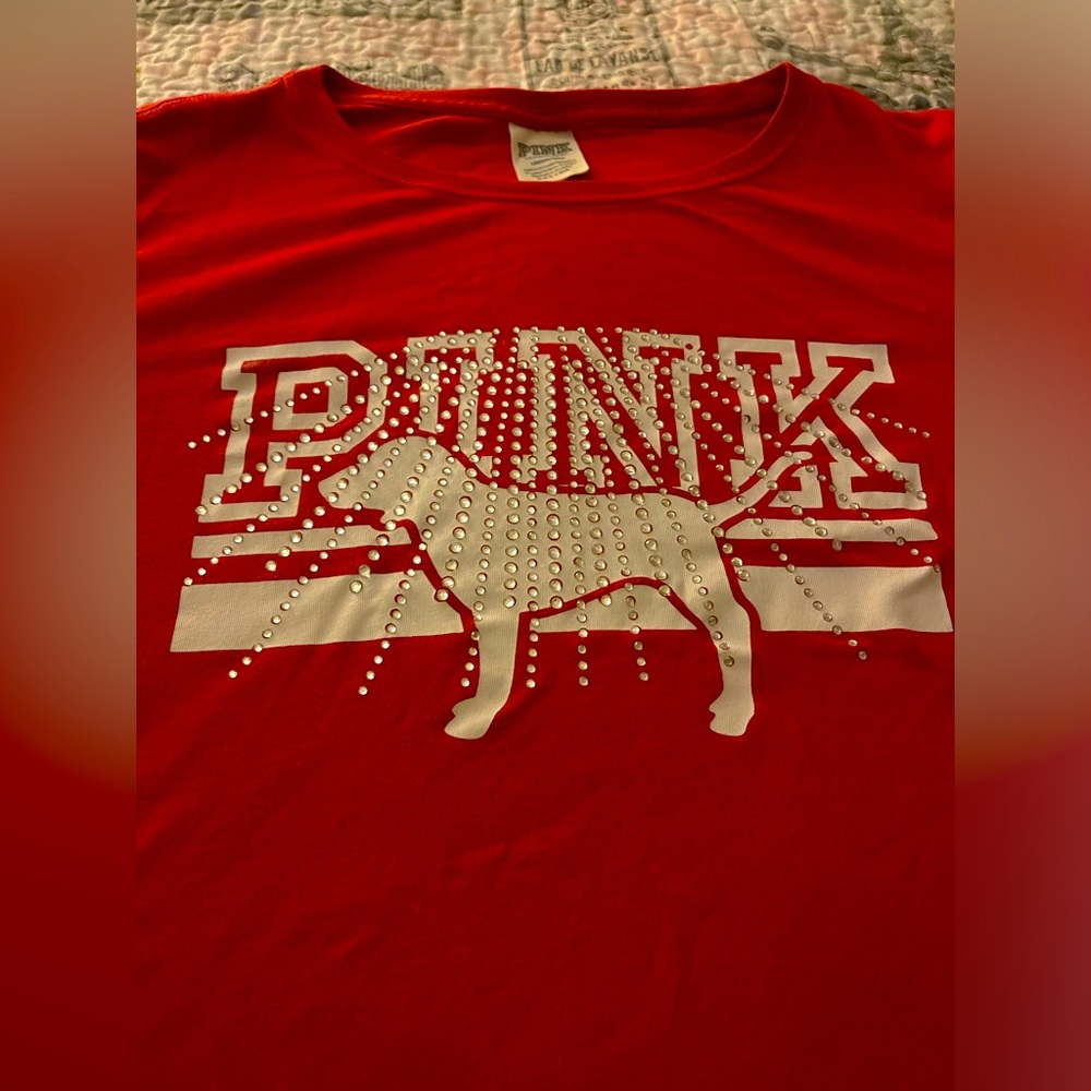 Great condition PINK top with silver bling.